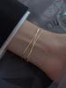Joyería de moda europea y americana cadena de eslabones de doble capa exquisita pulsera que combina con todo tendencia acero titanio chapado en oro joyería para novias