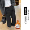 Pantalones casuales de cuadros negros y grises para mujer 2026 otoño e invierno nuevo estilo caída baja estatura lana franela holgados rectos de pierna ancha