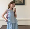 Chal sin mangas con lazo tridimensional de la primavera de 2026 Vestido falso de dos piezas