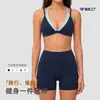 Nuevo sujetador deportivo cruzado de bloques de color transfronterizo para mujer, a prueba de impactos, de soporte, transpirable, de dos piezas simuladas, hermoso sujetador de yoga para espalda para correr