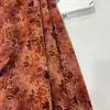 Estampado Floral en RelieveTela Estampada con Flores Doradas para Vestido Qipao de Mujer Chaleco Tela Floral Retro