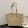 Bolsa Tote Grande com Padrão de Lichia Transfronteiriça para Mulheres 2026 Nova Cor Sólida Moda Casual para o Dia a Dia Simples Bolsa de Ombro