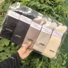 26 Calcetines Caídos de Media Pantorrilla para Mujer Otoño Invierno Calcetines de Pelo de Camello Calidez para Mujer Otoño Invierno Venta al por Mayor