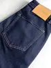 Los nuevos jeans de mezclilla azul oscuro de Sudu con fijación de color para mujer, versátiles y estilizados, hechos de Lyocell, con forro interior estampado y puños
