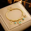 Nicho personalidad creativa moda hueco corazón ojos azules colgante cadena acero titanio metal joyería pulsera para combinar con todo