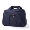 Venta al por mayor de fábrica mano de obra fina gran capacidad color sólido bolsa de equipaje portátil bolsa de viaje grande bolsa de viaje de viaje
