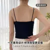 Camisola de cuello redondo con textura y un hermoso diseño en la espalda, con copas fijas, tejido transpirable, tacto agradable para la piel, construcción sin costuras y un estilo versátil. Esta camiseta sin mangas para mujer está diseñada para ser estilizada y favorecedora.