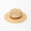 Sombrero de ala plana de rafia con cinta de gamuza calada de moda casual nuevo de primavera y verano europeo y americano, sombrero de paja para protección solar al aire libre
