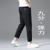 Jeans masculino de alta qualidade de Hong Kong com 89% de elasticidade para primavera e outono, marca super popular versátil retrô slim reto elástico moderno 89% calças