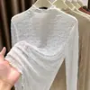 Procesamiento PersonalizadoBlusa de encaje de manga larga, cuello medio alto, corte ajustado, transparente, con bordes de volantes para mujer. Fuente OEM/ODM