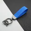 Colgante Llavero de Coche de Cuero Gamuzado Anillo de Resorte de Aleación de Zinc Cubierta de Llave Cadena de Llave con Logo de Coche Venta al por Mayor