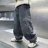 Pantalones Gruesos Forrados de Polar para Niños Otoño e Invierno 2025 Nuevo Estilo Polar Integrado Pantalones Cargo de Invierno para Estudiantes de Secundaria Niños Moda