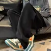 Pantalones casuales lisos de moda estilo Hong Kong, nuevos para otoño e invierno, holgados, versátiles, negros, de pierna ancha, deportivos retro, largos para hombre