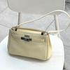 Bolsa de couro bovino Togo com camada de cabeça Kelly Bolsa portátil para axilas Bolsa transversal portátil com fivela Bolsa pequena quadrada para deslocamento