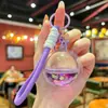 Llavero de Acrílico Creativo con Líquido, Aceite y Brillo de Arena Movediza, Colgante para Coche, Decoración para Bolso de Niña, Regalo Exquisito
