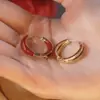 Brincos circulares vermelhos, festivos, com efeito de gota de óleo, nova tendência 2026, design de nicho, brincos versáteis de Ano Novo