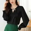 Tiro real 2025 camisa de satén color albaricoque francés diseño de primavera para mujer top ajustado de temperamento chic