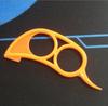 T fábrica mayoreo ratón de plástico grande abridor de naranja caracol pelador de naranja anillo pelador de naranja puede imprimir logo