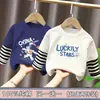 Ropa para niños para niños, camiseta de manga larga de retazos, imitación de dos piezas, camiseta base de algodón puro para niños mayores, nuevo estilo de top para primavera y otoño 2026