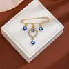 Broche de Borla Ojo del Diablo con Pedrería Creativa Europeo y Americano para Mujer, Pin de Estilo Vintage para Ceñir la Cintura de Suéter Ojo Azul de Alta Gama