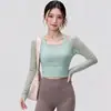 Ropa Nueva de Yoga Otoño e Invierno Tops Deportivos Adelgazantes Ajustados de Manga Larga con Almohadillas en el Pecho Trajes de Entrenamiento Fitness Venta al por Mayor