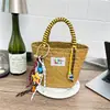 Bolsa de Vacaciones en la Playa para Mujer, Bolso de Mano Tipo Cesta Nuevo y de Moda Primavera 2026, Elegante Bolso de Paja Tejido a Mano