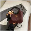 Moda Retrô Outono 2025 Nova Bolsa de Ombro Feminina Estilo Coreano Casual Bordado com Linha Bolsa de Mão Pequena Fragrância Bolsa Fosca