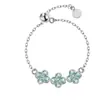 Flor de Primavera Chapado en Plata de Ley 925 Oro de 18 Quilates Zirconia de Cuatro Hojas Azul Hielo Fresco Anillo de Cadena Ajustable Anillo Suave