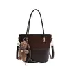 Bolso de Hombro Único Tipo Cubo Bolso Cruzado para Mujer Otoño 2026 Nuevo Alta Apariencia Simple Casual Bolso de Mano para el Trabajo