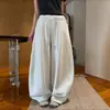 Pantalones deportivos de retazos con cordón y dobladillo curvo para mujer, nuevos pantalones de otoño de cintura alta de pierna ancha, holgados, adelgazantes, casuales, versátiles de pierna ancha