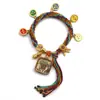 Pulseira do deus da riqueza de cinco vias estilo Xizang oito santos padroeiros cinco mestres Manjushri deus da riqueza amarelo thangka corda tecida à mão pulseira do ano desta vida