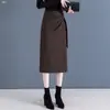 Procesamiento Personalizado Otoño 2026 Adelgazante Elegante de Cintura Alta Irregular Ceñido a la Cadera Media Longitud Falda Lápiz con Abertura para Mujer