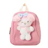 Nueva mochila escolar para niños pequeños de aspecto atractivo, mini mochila casual de nicho, mochila con colgante de felpa para niñas lindas