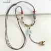Nuevo Collar de Cerámica de Caracola Estilo Chino Largo para Mujer Retro Nuevo Colgante Chino Cordón Nicho Versátil Cadena para Suéter