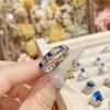 Anillo de Gema de Corindón Azul Camellia Haute Couture Joyería Diseño Lujo Francés Gama Alta Imitación Anillo de Diopsido Natural