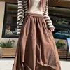 Saia de Veludo Cotelê Marrom para Mulheres, Novo Estilo Outono/Inverno 2026, Elegante Saia Longa Flare Marrom Emagrecedora para Mulheres A14079