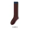 Calcetines de pantorrilla para mujer Primavera y Otoño Nuevos Calcetines Retro a bloques de color hasta la rodilla Estilo coreano Personalidad Calcetines holgados hasta la mitad de la pantorrilla Venta al por mayor