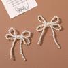 Lazo de flores de perla versátil y sencillo de Corea del Sur, tocado de cuentas hecho a mano, accesorios para el cabello, pendientes, material al por mayor
