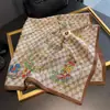 2025 Verano Más Vendido Delgado Versátil Protección Solar Bufanda Cuadrada Pequeña Elegante para Mujer Estampado de Seda Reductora de Edad Chal Pequeño Venta al por Mayor
