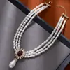 Estilo Francés Lujo Ligero Gama Alta Collar Antiguo Medio Colgante de Perlas Multicapa Aretes de Diamante Aretes Vintage Clásicos Collar