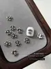 1000 piezas Plata Antigua Cruz Arte de Uñas Aleación Adornos Estilo Oscuro Punk Flor Decoración de Uñas Bolsa Completa Personalizado Venta al por Mayor