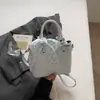 Bolso de Hombro Cruzado Casual de Nicho Shuai Mi, Estilo Cubo, Nuevo Verano 2026, Elegante y a la Moda, Lujo Ligero