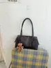 Bolsa de almofada de design de nicho transfronteiriça bolsa feminina nova moderna retrô bolsa Boston versátil para o dia a dia bolsa de ombro única para usar sob o braço