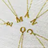 Moda europeia e americana estilo ins pingente de 26 letras design de nicho colar de aço titânio colar de aço inoxidável