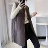 Colete de casaco para outono e inverno, comprimento médio, novo modelo 2025, couro-pelo integrado, peça externa, modelagem solta, colete feminino sem mangas, moderno