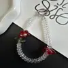 Corrente para Celular Floral Fresca de Verão com um Toque de Luxo Leve e High-End, Pingente de Bolsa de Cristal em Formato de Roda para Meninas