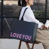 Bolsa de Papel Universal de Alta Gama para Centro Comercial Bolso de Mano Bolsas de Papel Engrosadas Bolsos con Logo Personalizado para Tiendas de Ropa Bolsas de Regalo