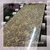 Muestras de Arenisca Granito Oro Verde Están Disponibles Gratuitamente y Se Pueden Procesar con Varios Acabados de Superficie como Superficie Corrugada, Superficie Perforada y Más