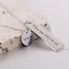 Europa e Estados Unidos novo amor transfronteiriço 12MM de comprimento 10MM gravação a laser colar simples redondo de aço inoxidável feminino