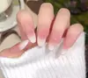 Manicura Color Nude Hecha Completamente a Mano Estilo Corto Usable Estilo Año Nuevo 2025 Gama Alta Exquisita Primavera y Verano Color Puro Blanqueador